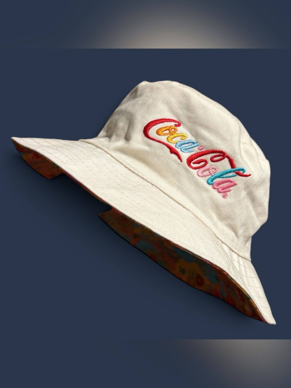 Coca-Cola 1971 Unity Collection reversible bucket hat featuring a colorful